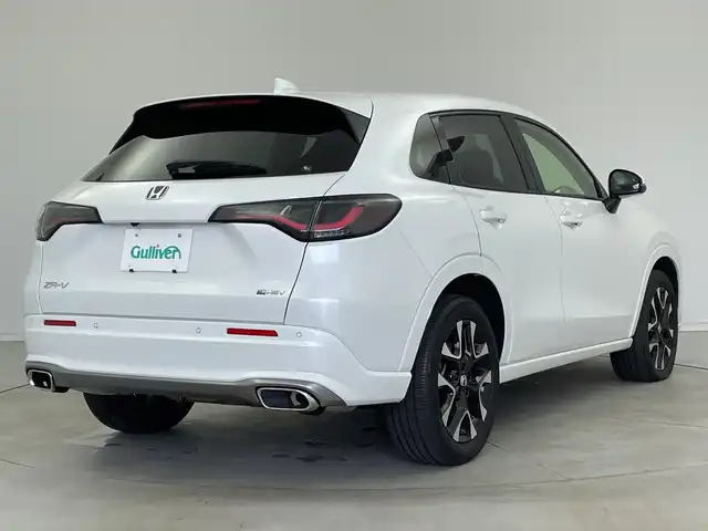 ホンダ ＺＲ－Ｖ ハイブリッド e:HEV Z 新潟県 2023(令5)年 1.9万km プラチナホワイトパール 純正ホンダコネクトディスプレイナビ/（BT/FM/AM/フルセグTV)/全周囲カメラ/ステアリングスイッチ/ステアリングヒーター/パドルシフト/置くだけ充電/D/Nパワーシート/レザーシート/シートヒーター/シートメモリー/ブラインドスポットモニター/ETC/取扱説明書/保証書/整備記録簿