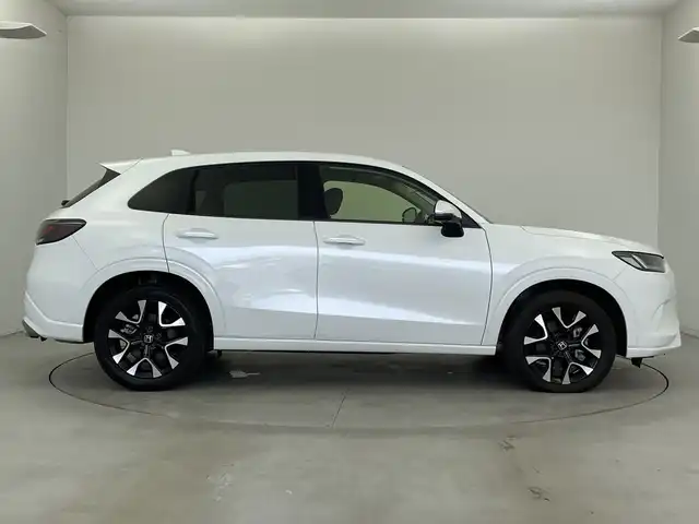 ホンダ ＺＲ－Ｖ ハイブリッド e:HEV Z 新潟県 2023(令5)年 1.9万km プラチナホワイトパール 純正ホンダコネクトディスプレイナビ/（BT/FM/AM/フルセグTV)/全周囲カメラ/ステアリングスイッチ/ステアリングヒーター/パドルシフト/置くだけ充電/D/Nパワーシート/レザーシート/シートヒーター/シートメモリー/ブラインドスポットモニター/ETC/取扱説明書/保証書/整備記録簿