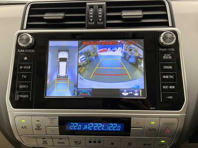 トヨタ ランドクルーザー プラド TX Lパッケージ 長野県 2019(令1)年 1.6万km スーパーホワイトⅡ 4WD/純正ナビ/トヨタセーフティセンスP/前後ドライブレコーダー/全方位カメラ/バックカメラ/社外レーダー/フルセグTV/Bluetooth/USB/AUX/ビルトインETC2.0/サンルーフ/パワーシート（運転席、助手席）/エアシート（運転席、助手席）/デジタルインナーミラー/オートライト/LEDヘッドライト/オートマチックハイビーム/フォグランプ/ヘッドライトウォッシャー/ステアリングスイッチ/木目調革巻きステアリング/純正フロアマット/純正アルミホイール/電動格納ミラー/ウインカーミラー/エンジンスターター/ルーフレール