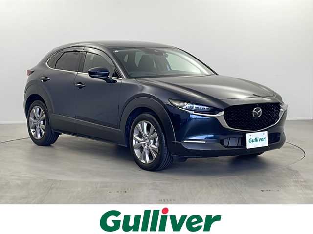 マツダ ＣＸ－３０ 栃木県 2021(令3)年 1.1万km 紺 純正ナビ/CD/DVD/TV/FM/AM/ETC/ドライブレコーダー/追従走行付きクルーズコントロール/バック、フロント、サイドカメラ/360度カメラ/スマートキー/プッシュスタート/パドルシフト/運転席パワーシート/前席シートヒーター/ステアリングヒーター/電動リアゲート/電動格納ミラー/MTモード付AT/横滑り防止装置/衝突軽減