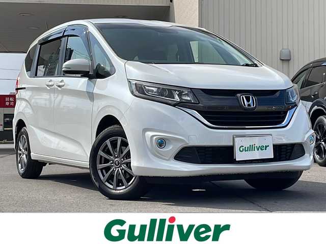ホンダ フリード＋ G 道北・旭川 2018(平30)年 2.6万km ホワイトオーキッドパール ・4WD/・寒冷地仕様/・禁煙車/・純正ナビ CD/DVD/SD/BT/フルセグ/・両側パワースライドドア/・シートヒーター/・LEDヘッドライト/・バックカメラ/・ドライブレコーダー/・オートライト/・フォグランプ/・ビルトインETC/・純正ホイール付冬タイヤ積載/・サンシェード/・純正フロアマット/・保証書/・取説
