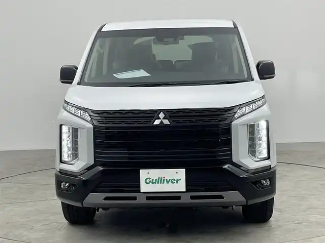 三菱 デリカＤ：５ シャモニー 愛知県 2025(令7)年 0.1万km未満 パールⅡ 登録済み未使用車/CHAMONIX (7人)　/4WD/アラウンドビューカメラ装着車両/11インチアルパインナビ/アダプティブクルーズコントロール/レーンキープアシスト/ブラインドスポットモニター/パワーバックドア/12.8インチフリップダウンモニター/両側パワースライドドア/パドルシフト/フルセグTV/Bluetooth/CD/DVD/ステアリングヒーター/ハーフレザーシート/電動パーキングシステム/自動防眩ミラー/HDMI/USB/スペアキー