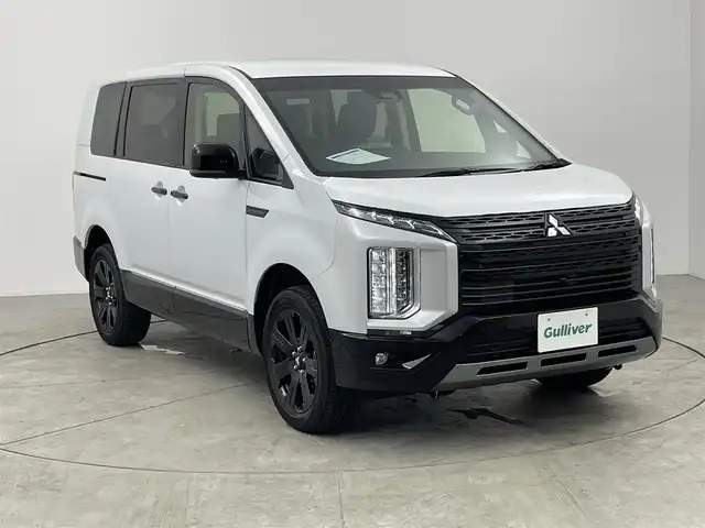 三菱 デリカＤ：５ シャモニー 愛知県 2025(令7)年 0.1万km未満 パールⅡ 登録済み未使用車/CHAMONIX (7人)　/4WD/アラウンドビューカメラ装着車両/11インチアルパインナビ/アダプティブクルーズコントロール/レーンキープアシスト/ブラインドスポットモニター/パワーバックドア/12.8インチフリップダウンモニター/両側パワースライドドア/パドルシフト/フルセグTV/Bluetooth/CD/DVD/ステアリングヒーター/ハーフレザーシート/電動パーキングシステム/自動防眩ミラー/HDMI/USB/スペアキー