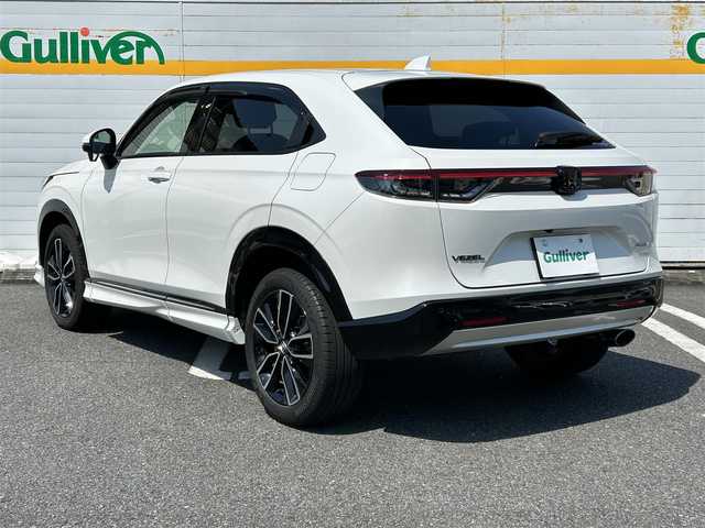 ホンダ ヴェゼル ハイブリッド e:HEV Z 埼玉県 2023(令5)年 2.7万km プラチナホワイトパール ワンオーナー/純正ディーラーメモリナビ/衝突被害軽減ブレーキ/ダウンヒルアシストコントロール/パワーバックドア/フルセグテレビ/バックカメラ/ETC/レーンアシスト/横滑り防止装置/クリアランスソナー/BSM/シートヒーター/ABS/パーキングアシスト/純正フロアマット/ドライブレコーダー/Bluetooth接続/DVD・CD再生/AAC/PW/PS/純正アルミホイール/プッシュスタート