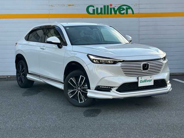 ホンダ ヴェゼル ハイブリッド e:HEV Z 埼玉県 2023(令5)年 2.7万km プラチナホワイトパール ワンオーナー/純正ディーラーメモリナビ/衝突被害軽減ブレーキ/ダウンヒルアシストコントロール/パワーバックドア/フルセグテレビ/バックカメラ/ETC/レーンアシスト/横滑り防止装置/クリアランスソナー/BSM/シートヒーター/ABS/パーキングアシスト/純正フロアマット/ドライブレコーダー/Bluetooth接続/DVD・CD再生/AAC/PW/PS/純正アルミホイール/プッシュスタート