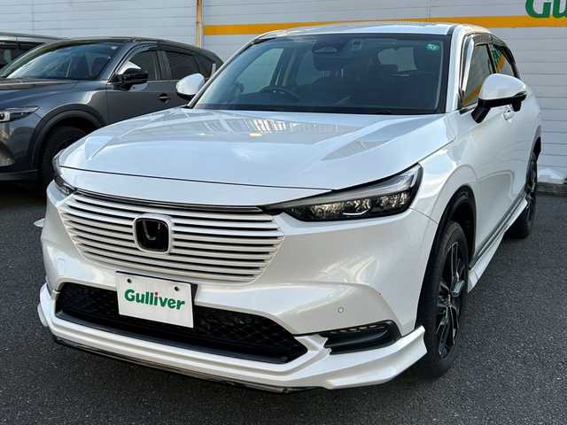 ホンダ ヴェゼル ハイブリッド e:HEV Z 埼玉県 2023(令5)年 2.7万km プラチナホワイトパール ワンオーナー/純正ディーラーメモリナビ/衝突被害軽減ブレーキ/ダウンヒルアシストコントロール/パワーバックドア/フルセグテレビ/バックカメラ/ETC/レーンアシスト/横滑り防止装置/クリアランスソナー/BSM/シートヒーター/ABS/パーキングアシスト/純正フロアマット/ドライブレコーダー/Bluetooth接続/DVD・CD再生/AAC/PW/PS/純正アルミホイール/プッシュスタート
