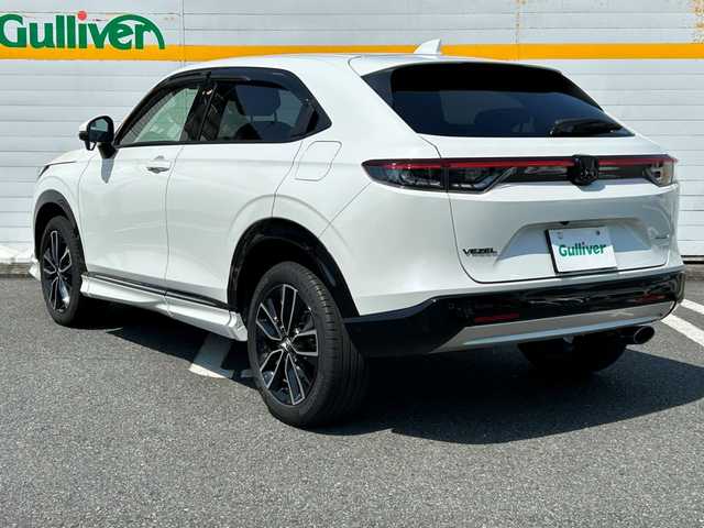 ホンダ ヴェゼル ハイブリッド e:HEV Z 埼玉県 2023(令5)年 2.7万km プラチナホワイトパール ワンオーナー/純正ディーラーメモリナビ/衝突被害軽減ブレーキ/ダウンヒルアシストコントロール/パワーバックドア/フルセグテレビ/バックカメラ/ETC/レーンアシスト/横滑り防止装置/クリアランスソナー/BSM/シートヒーター/ABS/パーキングアシスト/純正フロアマット/ドライブレコーダー/Bluetooth接続/DVD・CD再生/AAC/PW/PS/純正アルミホイール/プッシュスタート