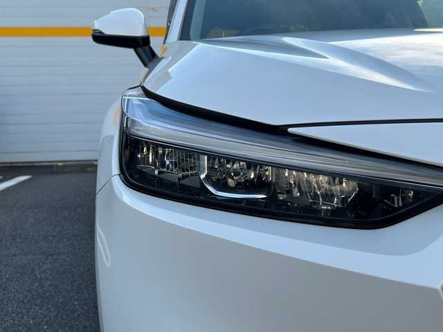 ホンダ ヴェゼル ハイブリッド e:HEV Z 埼玉県 2023(令5)年 2.7万km プラチナホワイトパール ワンオーナー/純正ディーラーメモリナビ/衝突被害軽減ブレーキ/ダウンヒルアシストコントロール/パワーバックドア/フルセグテレビ/バックカメラ/ETC/レーンアシスト/横滑り防止装置/クリアランスソナー/BSM/シートヒーター/ABS/パーキングアシスト/純正フロアマット/ドライブレコーダー/Bluetooth接続/DVD・CD再生/AAC/PW/PS/純正アルミホイール/プッシュスタート