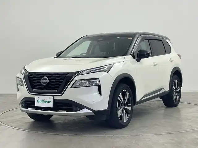 日産 エクストレイル G e－4ORCE 群馬県 2023(令5)年 3.4万km ブリリアントホワイトパール/スーパーブラック 2トーン 純正１２．３型ナビ　全周囲カメラ　デジタルインナーミラー　レザーシート　前席シートヒーター　置くだけ充電　プロパイロット　アダプティブクルーズコントロール　ＨＵＤ　衝突被害軽減ブレーキ　ＢＳＭ　禁煙
