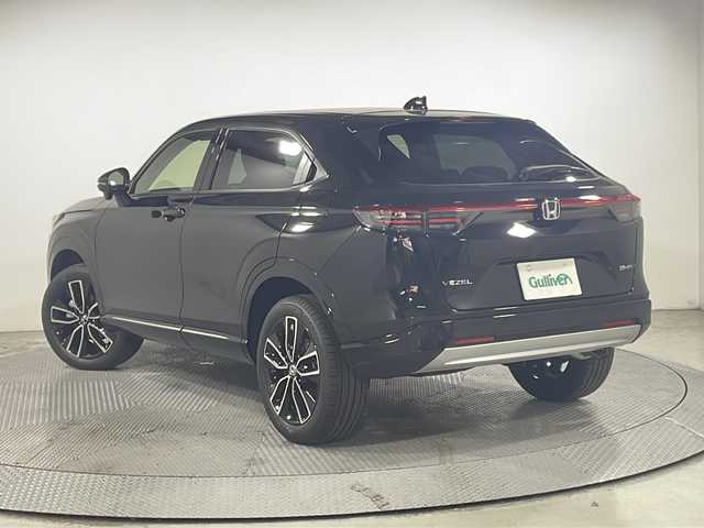 ホンダ ヴェゼル ハイブリッド e:HEV Z 広島県 2025(令7)年 0.1千km クリスタルブラックパール 登録済未使用車/9型Honda CONNECTディスプレイ/パワーテールゲート/ハーフレザーシート/シートヒーター/ステアリングヒーター/減速セレクター/バックカメラ/ヒルディセントコントロール/ホンダセンシング/・衝突軽減ブレーキ/・誤発進抑制機能/・車線逸脱警報/・パーキングセンサー/・アダプティブクルーズコントロール/・アダプティブドライビングビーム/・ブラインドスポットインフォメーション/ETC2.0/ワイヤレス充電/USB入力端子