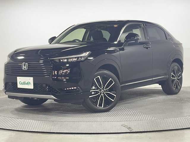 ホンダ ヴェゼル ハイブリッド e:HEV Z 広島県 2025(令7)年 0.1千km クリスタルブラックパール 登録済未使用車/9型Honda CONNECTディスプレイ/パワーテールゲート/ハーフレザーシート/シートヒーター/ステアリングヒーター/減速セレクター/バックカメラ/ヒルディセントコントロール/ホンダセンシング/・衝突軽減ブレーキ/・誤発進抑制機能/・車線逸脱警報/・パーキングセンサー/・アダプティブクルーズコントロール/・アダプティブドライビングビーム/・ブラインドスポットインフォメーション/ETC2.0/ワイヤレス充電/USB入力端子