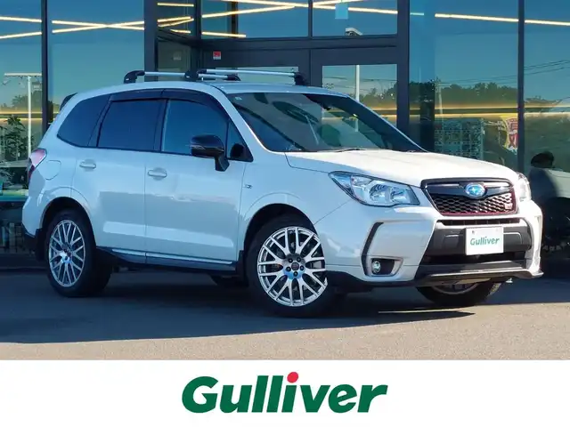 スバル フォレスター tS 東京都 2015(平27)年 9.5万km サテンホワイトパール 300台限定車/フロントスポイラー/専用ＢＢＳ製19インチアルミ/専用サスペンション/アイサイト/純正ダイアトーンサウンドナビ〔NR-MZ200PREMI〕/　・フルセグTV/　・Bluetooth接続/　・SDミュージックサーバー/　・CD/DVD再生/　・AM/FMラジオ/　・USB/アルパイン製フリップダウンモニター/バックカメラ/ビルトインETC/前後３６０°ドライブレコーダー〔ZDR037〕/社外ステアリング〔純正エアバッグ付き〕/ハーフレザーシート/シートヒーター/パワーシート/パワーリヤゲート/プッシュスタート/スマートキー×２/保証書/整備記録簿/取扱説明書