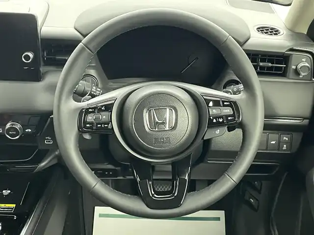 ホンダ ヴェゼル ハイブリッド e:HEV Z 埼玉県 2025(令7)年 0.1千km クリスタルブラックパール 登録済未使用車　純正９型ＤＡ　ＴＶ　ＢＴ　ＥＴＣ２．０　ＢＳＭ　バックカメラ　電動リアゲート　シートヒーター　ハーフレザーシート　ダウンヒルアシストコントロール　ホンダセンシング　LEDヘッドライト　置くだけ充電　ハンドルヒーター