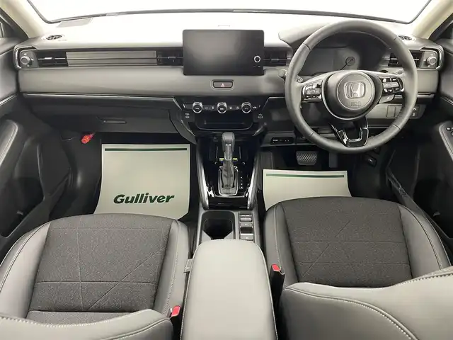ホンダ ヴェゼル ハイブリッド e:HEV Z 埼玉県 2025(令7)年 0.1千km クリスタルブラックパール 登録済未使用車　純正９型ＤＡ　ＴＶ　ＢＴ　ＥＴＣ２．０　ＢＳＭ　バックカメラ　電動リアゲート　シートヒーター　ハーフレザーシート　ダウンヒルアシストコントロール　ホンダセンシング　LEDヘッドライト　置くだけ充電　ハンドルヒーター