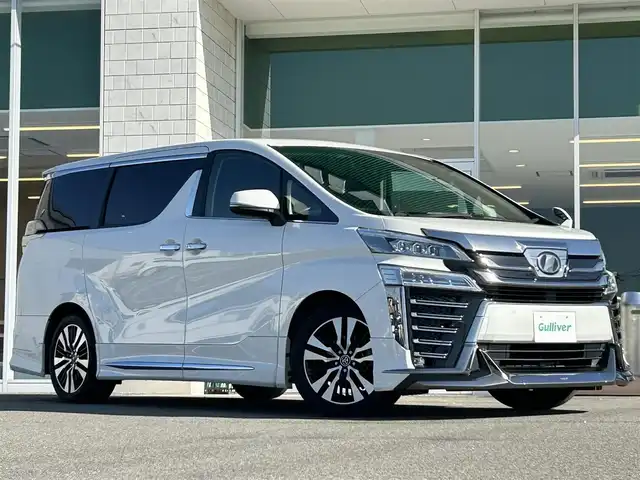 トヨタ ヴェルファイア Z Gエディション 兵庫県 2019(平31)年 6.1万km ホワイトパールクリスタルシャイン ALPINE11インチナビ/フルセグテレビ/BTオーディオ/ALPINEフリップダウンモニター/バックカメラ/モデリスタエアロ/パワーシート/シートベンチレーション/ステアリングヒーター/両側パワースライドドア/デジタルインナーミラー/電動パーキングブレーキ/オートホールド/LEDヘッドライト/純正18インチAW/スペアキー