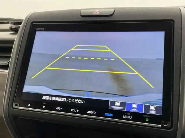 ホンダ フリード G ホンダセンシング 岡山県 2020(令2)年 5.6万km スーパープラチナグレーメタリック 純正9インチメモリナビ/　「フルセグ/BT/CD/DVD/USB」/フリップダウンモニター（HDMI接続有り）/ワイパーデアイサー/バックカメラ/追従型クルーズコントロール/ビルトインETC/前席シートヒーター/衝突軽減ブレーキシステム/車線逸脱防止システム/横滑り防止装置/純正１５インチアルミ/純正フロアマット/ヘッドライトレベライザー/ハロゲンヘッドライト（AUTO機能付き）/ステアリングスイッチ/プッシュスタート/スマートキー×1