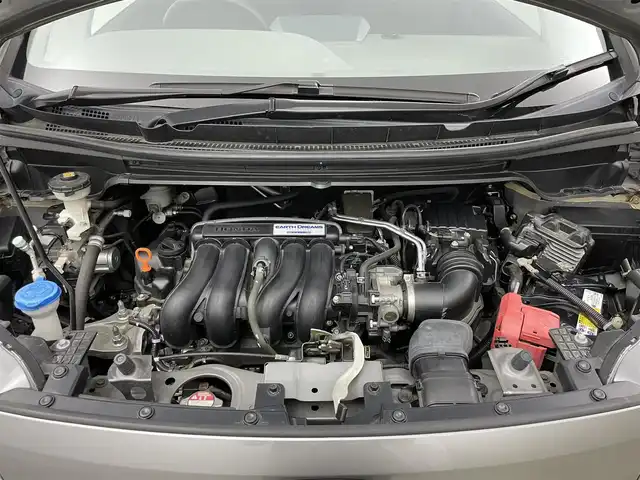 ホンダ フリード G ホンダセンシング 岡山県 2020(令2)年 5.6万km スーパープラチナグレーメタリック 純正9インチメモリナビ/　「フルセグ/BT/CD/DVD/USB」/フリップダウンモニター（HDMI接続有り）/ワイパーデアイサー/バックカメラ/追従型クルーズコントロール/ビルトインETC/前席シートヒーター/衝突軽減ブレーキシステム/車線逸脱防止システム/横滑り防止装置/純正１５インチアルミ/純正フロアマット/ヘッドライトレベライザー/ハロゲンヘッドライト（AUTO機能付き）/ステアリングスイッチ/プッシュスタート/スマートキー×1