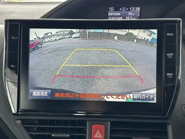 トヨタ ヴォクシー ハイブリッド V 茨城県 2016(平28)年 7.2万km ブラック 10型純正ナビ（AM/FM/TV/Bluetooth/HDMI)/フリップダウンモニター/トヨタセーフティセンスC（衝突回避支援パッケージ）/・プリクラッシュセーフティシステム/・レーンディパーチャーアラート/・オートマチックハイビーム/先行車発進告知機能/前後ドライブレコーダー/シートヒーター/ビルトインETC/クルーズコントロール/LEDヘッドライト/両側パワースライドドア/オートマチックハイビーム/オートライト/純正フロアマット/衝突被害軽減システム/レーンキープアシスト/スペアキー/保証書/取扱説明書