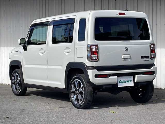 スズキ ハスラー HYBRID X 長野県 2023(令5)年 1.5万km ピュアホワイトP ４WD/衝突被害軽減システム/純正15インチアルミ/アイドリングストップ/パーキングアシスト/純正フロアマット/バイザー/シートヒーター/クルーズコントロール/保証書・取説・スペアキー