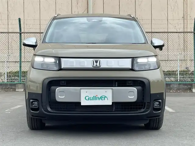 ホンダ フリード ハイブリット e:HEV クロスター 東京都 2025(令7)年 0.1千km ベージュ e:HEV クロスター　2LE40C3　6人　9インチナビ　LXM-242ZFNI(207680円)/登録済未使用車　/純正９型ナビ　/ホンダセンシング　/両側電動ドア　/ハーフレザー　/追従クルコン　/フルセグＴＶ　/Ｂｌｕｅｔｏｏｔｈ　/純正１５インチＡＷ　/LEDヘッド　/コーナーセンサー　/オートライト