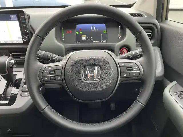 ホンダ フリード ハイブリット e:HEV クロスター 東京都 2025(令7)年 0.1千km ベージュ e:HEV クロスター　2LE40C3　6人　9インチナビ　LXM-242ZFNI(207680円)/登録済未使用車　/純正９型ナビ　/ホンダセンシング　/両側電動ドア　/ハーフレザー　/追従クルコン　/フルセグＴＶ　/Ｂｌｕｅｔｏｏｔｈ　/純正１５インチＡＷ　/LEDヘッド　/コーナーセンサー　/オートライト