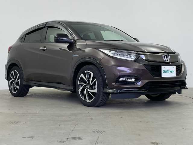 ホンダ ヴェゼル ハイブリッド RS ホンダセンシング 鹿児島県 2018(平30)年 4.9万km オーロラアメジストメタリック ホンダセンシング/・衝突軽減ブレーキ/・誤発進抑制機能/・アダプティブクルーズコントロール/・車線維持支援システム/純正SDリナビ/CD/DVD/BT/フルセグTV/バックカメラ/LEDオートライト/フォグランプ/合皮ハーフレザーシート/シートヒーター/純正18インチアルミホイール/パドルシフト/アイドリングストップ/スマートキー/ビルトインETC