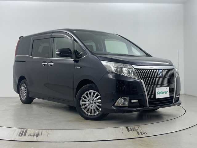 トヨタ エスクァイア ハイブリッド Gi 埼玉県 2015(平27)年 5.2万km スパークリングブラックパールクリスタルシャイン 純正9インチナビ　NSZT-Y64T/(Bluetooth/CD/DVD/AM/FM)/地デジフルセグ/バックカメラ/前後ドライブレコーダー/ETC/クルーズコントロール/運転席・助手席シートヒーター/ワイヤレス充電/プッシュスタート/ステアリングリモコン/両側パワースライドドア/ロールサンシェード/ウィンカーミラー/電動格納ミラー/フロントフォグランプ/純正フロアマット/純正ドアバイザー/純正15インチアルミホイール
