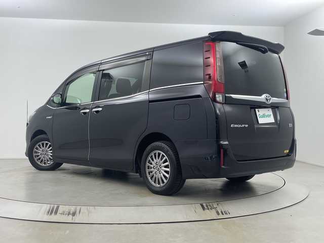 トヨタ エスクァイア ハイブリッド Gi 埼玉県 2015(平27)年 5.2万km スパークリングブラックパールクリスタルシャイン 純正9インチナビ　NSZT-Y64T/(Bluetooth/CD/DVD/AM/FM)/地デジフルセグ/バックカメラ/前後ドライブレコーダー/ETC/クルーズコントロール/運転席・助手席シートヒーター/ワイヤレス充電/プッシュスタート/ステアリングリモコン/両側パワースライドドア/ロールサンシェード/ウィンカーミラー/電動格納ミラー/フロントフォグランプ/純正フロアマット/純正ドアバイザー/純正15インチアルミホイール