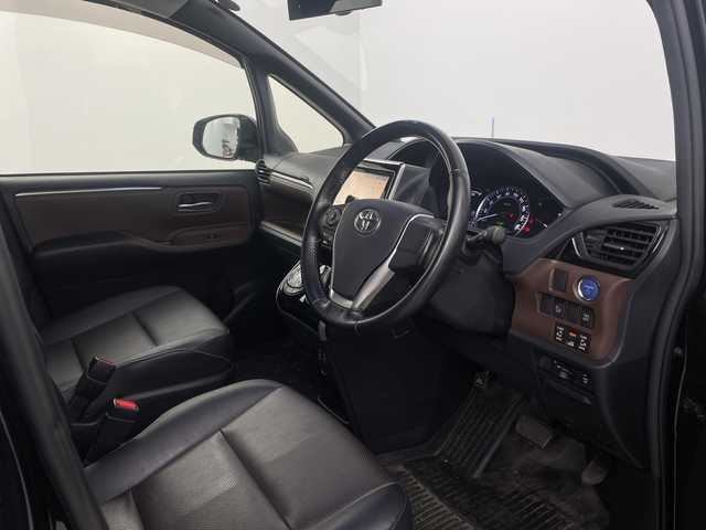 トヨタ エスクァイア ハイブリッド Gi 埼玉県 2015(平27)年 5.2万km スパークリングブラックパールクリスタルシャイン 純正9インチナビ　NSZT-Y64T/(Bluetooth/CD/DVD/AM/FM)/地デジフルセグ/バックカメラ/前後ドライブレコーダー/ETC/クルーズコントロール/運転席・助手席シートヒーター/ワイヤレス充電/プッシュスタート/ステアリングリモコン/両側パワースライドドア/ロールサンシェード/ウィンカーミラー/電動格納ミラー/フロントフォグランプ/純正フロアマット/純正ドアバイザー/純正15インチアルミホイール