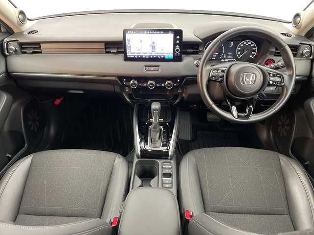 ホンダ ヴェゼル ハイブリッド e:HEV Z 富山県 2024(令6)年 1.7万km プレミアムサンライトホワイトパール ４WD/純正ナビ9インチ/（BT/CD/DVD/FM/AM/USB/Apple Car Play/Android Auto)/フルセグTV/プレミアムサウンド/全方位カメラ/バックカメラ/衝突被害軽減ブレーキ/横滑り防止装置/盗難防止装置/アダプティブクルーズコントロール/レーンキープアシスト/ブラインドスポットモニター/オートマチッックハイビーム/ダウンヒルアシストコントロール/電動リアゲート/置くだけ充電（ワイヤレス充電）/シートヒーター/ETC/ドライブレコーダー前後/スマートキー/プッシュスタート/ドアバイザー