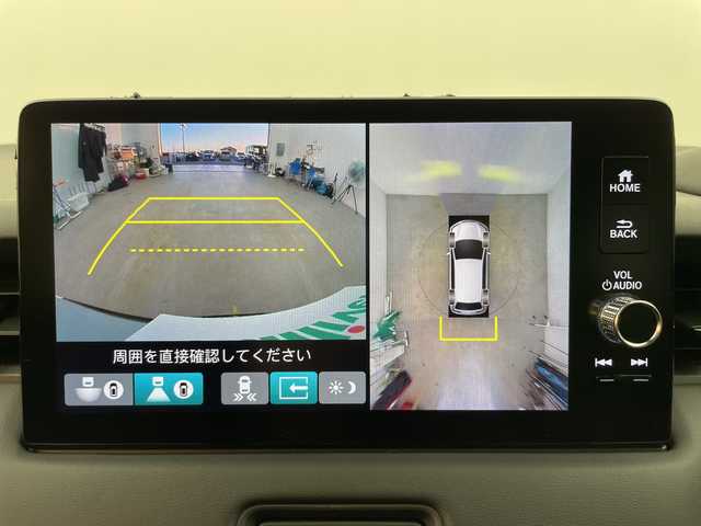 ホンダ ヴェゼル ハイブリッド e:HEV Z 富山県 2024(令6)年 1.7万km プレミアムサンライトホワイトパール ４WD/純正ナビ9インチ/（BT/CD/DVD/FM/AM/USB/Apple Car Play/Android Auto)/フルセグTV/プレミアムサウンド/全方位カメラ/バックカメラ/衝突被害軽減ブレーキ/横滑り防止装置/盗難防止装置/アダプティブクルーズコントロール/レーンキープアシスト/ブラインドスポットモニター/オートマチッックハイビーム/ダウンヒルアシストコントロール/電動リアゲート/置くだけ充電（ワイヤレス充電）/シートヒーター/ETC/ドライブレコーダー前後/スマートキー/プッシュスタート/ドアバイザー