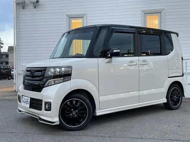 ホンダ Ｎ ＢＯＸ 2トーン カスタム G ターボLパッケージ 富山県 2015(平27)年 9.6万km プレミアムホワイトパールⅡ (株)IDOMが運営する【じしゃロン富山店】の自社ローン専用車両になります。こちらは現金またはオートローンご利用時の価格です。自社ローンご希望の方は別途その旨お申し付け下さい/クルーズコントロール/フルセグTV/バックカメラ/Bluetooth/両側パワースライドドア