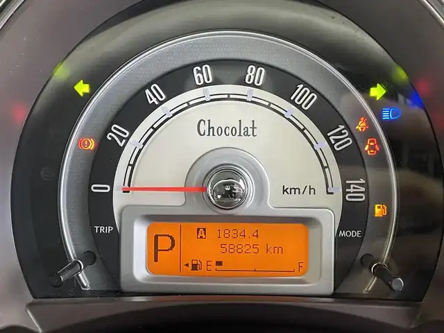 スズキ ラパン ショコラ X 群馬県 2014(平26)年 5.9万km カシスピンクパールメタリック 社外７インチナビ　Ｂｌｕｅｔｏｏｔｈ　ＣＤ　ＤＶＤ　バックカメラ　ＨＩＤヘッドライト　アイドリングストップ　オートエアコン　純正フロアマット　スマートキー　プッシュスタート　オートライト　禁煙車