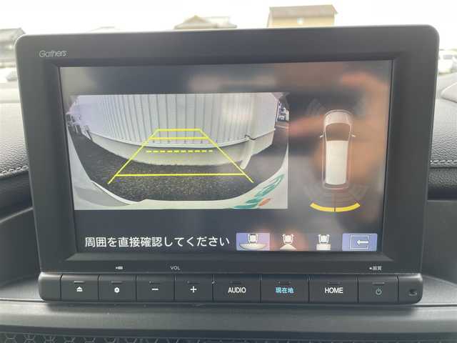 ホンダ ステップワゴン スパーダ 熊本県 2023(令5)年 0.7万km プラチナホワイトパール 純正ナビ/・AM/FM/CD/DVD/BT/SD/・バックカメラ/・TV走行中視聴可能/Honda SENSING/・衝突軽減ブレーキ/・歩行者事故低減ステアリング/・路外逸脱制御機能/・アダプティブクルーズコントロール/・車線維持支援機能/電動格納ミラー/・ブラインドスポットモニター/電動パーキングブレーキ/・ブレーキホールド/ハーフレザーシート/・オットマン（2列目）/・前席シートヒーター/ETC/後席充電ポート（2列目・3列目共に）/後席サンシェード/クリアランスソナー/パドルシフト/シーケンシャルウィンカー/格納シート（3列目）/前後ドライブレコーダー/プッシュスタート/スマートキー