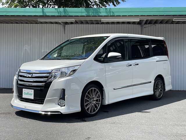 トヨタ ノア Si 長野県 2015(平27)年 6万km ホワイトパールクリスタルシャイン モデリスタエアロ/アルパイン10インチナビフルセグTV/フリップダウンモニター/バックカメラ/ビルトインETC/両側パワースライドドア/社外18インチアルミ/クルーズコントロール/保証書・取説/スペアキー