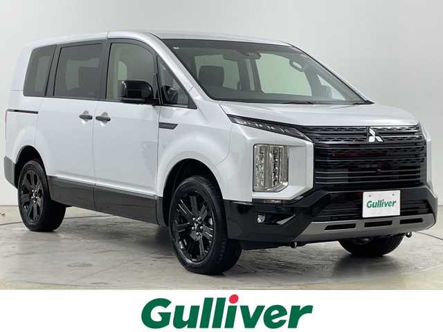 三菱 デリカＤ：５ シャモニー 道央・札幌 2025(令7)年 0.1千km 白Ⅱ ・CHAMONIX (8人)　4WD・/　e-Assist　/寒冷地仕様/・オリジナルナビ取付パッケージ/・マルチアラウンドモニタ-/・＋リアモニター取付パッケージ(25300円)　/・D:5専用11型ナビゲーション(322300円)/・アルパイン　ナビ/フルセグTV/・DVD/CD再生機能　Bluetooth接続/・Apple CarPlay　Android Auto対応/・12.8型後席用モニター(143550円)/・衝突被害軽減ブレーキシステム/・レーダークルーズコントロールシステム/・オートマチックハイビーム/LEDライト/・エレクトリックテールゲート/両側パワースライドドア/・ハーフレザーシート/・運転席パワーシート/前席シートヒーター/・パドルシフト/ウインカーミラー/・純正18インチアルミホイル/・サイド/カーテンエアバッグ/・スマートキー/スペアーキー