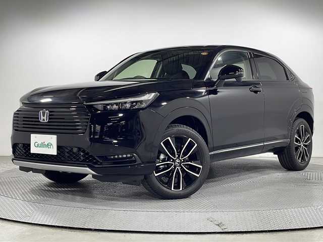 ホンダ ヴェゼル ハイブリッド e:HEV Z 広島県 2025(令7)年 0.1千km クリスタルブラックパール 登録済未使用車（5km）/9型Honda CONNECTディスプレイ/パワーテールゲート/ハーフレザーシート/シートヒーター/ステアリングヒーター/ホンダセンシング/・衝突軽減ブレーキ/・誤発進抑制機能/・レーンキープアシスト/・パーキングセンサー/・アダプティブクルーズコントロール/・アダプティブドライビングビーム/・ブラインドスポットインフォメーション/バックカメラ/減速セレクター/ヒルディセントコントロール/電動パーキングブレーキ/オートブレーキホールド/LEDヘッドランプ/オートライト/ETC2.0/ワイヤレス充電/USB入力端子