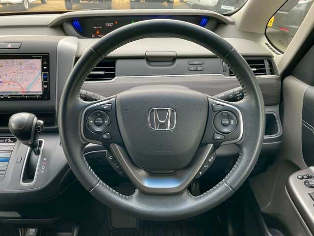 ホンダ フリード G ホンダセンシング 岩手県 2019(平31)年 5.5万km フォレストグリーンパール 純正メモリナビ/Bluetooth/CD/DVD/フルセグTV/レーダークルーズコントロール/ホンダセンシング/バックカメラ/前後ドラレコ/ETC/アイドリングストップ/両側パワースライドドア/純正フロアマット/ドアバイザー/純正アルミホイール/電動格納ミラー