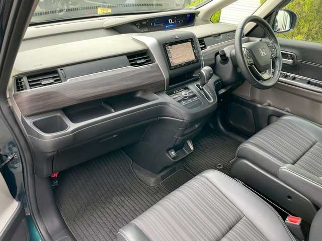 ホンダ フリード G ホンダセンシング 岩手県 2019(平31)年 5.5万km フォレストグリーンパール 純正メモリナビ/Bluetooth/CD/DVD/フルセグTV/レーダークルーズコントロール/ホンダセンシング/バックカメラ/前後ドラレコ/ETC/アイドリングストップ/両側パワースライドドア/純正フロアマット/ドアバイザー/純正アルミホイール/電動格納ミラー