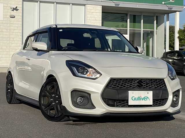 スズキ スイフト スポーツ セーフティPKG 香川県 2018(平30)年 7万km ピュアホワイトP 純正SDナビ（フルセグTV/CD，DVD再生/BT)/アラウンドビューモニター/シートヒーター/ローダウン/HKSマフラー/ビルトインETC/純正フロアマット/オートライト