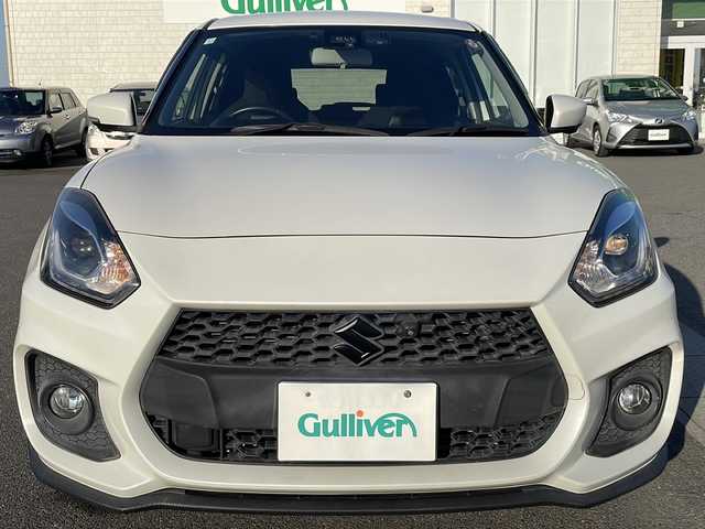 スズキ スイフト スポーツ セーフティPKG 香川県 2018(平30)年 7万km ピュアホワイトP 純正SDナビ（フルセグTV/CD，DVD再生/BT)/アラウンドビューモニター/シートヒーター/ローダウン/HKSマフラー/ビルトインETC/純正フロアマット/オートライト