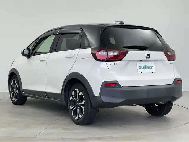 ホンダ フィット e:HEVクロスター 新潟県 2020(令2)年 2.6万km プラチナホワイトパール 純正メモリナビ【VXM-205VFEi】/　フルセグTV/Bluetooth/DVD/USB/ホンダセンシング/・衝突被害軽減ブレーキ/・誤発進抑制機能/・後方誤発進抑制機能/・近距離衝突軽減ブレーキ/・歩行者事故低減ステアリング/・路外逸脱抑制機能/・渋滞追従機能付アダプティブ・クルーズ・コントロール/・車線維持支援システム/・先行車発進お知らせ機能/・標識認識機能/・オートハイビーム/前後コーナーセンサー/前後ドライブレコーダー/バックモニター/ビルトインETC/LEDヘッドライト/横滑り防止装置