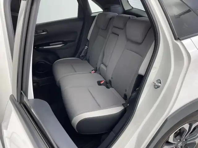 ホンダ フィット e:HEVクロスター 新潟県 2020(令2)年 2.6万km プラチナホワイトパール 純正メモリナビ【VXM-205VFEi】/　フルセグTV/Bluetooth/DVD/USB/ホンダセンシング/・衝突被害軽減ブレーキ/・誤発進抑制機能/・後方誤発進抑制機能/・近距離衝突軽減ブレーキ/・歩行者事故低減ステアリング/・路外逸脱抑制機能/・渋滞追従機能付アダプティブ・クルーズ・コントロール/・車線維持支援システム/・先行車発進お知らせ機能/・標識認識機能/・オートハイビーム/前後コーナーセンサー/前後ドライブレコーダー/バックモニター/ビルトインETC/LEDヘッドライト/横滑り防止装置