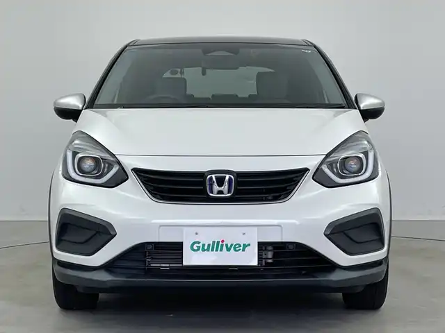 ホンダ フィット e:HEVクロスター 新潟県 2020(令2)年 2.6万km プラチナホワイトパール 純正メモリナビ【VXM-205VFEi】/　フルセグTV/Bluetooth/DVD/USB/ホンダセンシング/・衝突被害軽減ブレーキ/・誤発進抑制機能/・後方誤発進抑制機能/・近距離衝突軽減ブレーキ/・歩行者事故低減ステアリング/・路外逸脱抑制機能/・渋滞追従機能付アダプティブ・クルーズ・コントロール/・車線維持支援システム/・先行車発進お知らせ機能/・標識認識機能/・オートハイビーム/前後コーナーセンサー/前後ドライブレコーダー/バックモニター/ビルトインETC/LEDヘッドライト/横滑り防止装置