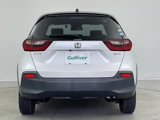 ホンダ フィット e:HEVクロスター 新潟県 2020(令2)年 2.6万km プラチナホワイトパール 純正メモリナビ【VXM-205VFEi】/　フルセグTV/Bluetooth/DVD/USB/ホンダセンシング/・衝突被害軽減ブレーキ/・誤発進抑制機能/・後方誤発進抑制機能/・近距離衝突軽減ブレーキ/・歩行者事故低減ステアリング/・路外逸脱抑制機能/・渋滞追従機能付アダプティブ・クルーズ・コントロール/・車線維持支援システム/・先行車発進お知らせ機能/・標識認識機能/・オートハイビーム/前後コーナーセンサー/前後ドライブレコーダー/バックモニター/ビルトインETC/LEDヘッドライト/横滑り防止装置