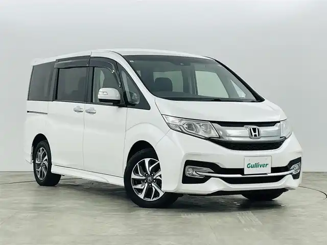 ホンダ ステップワゴン スパーダ ホンダセンシング 福島県 2017(平29)年 14.4万km ホワイトオーキッドパール ホンダセンシング/・衝突軽減ブレーキ/・アダプティブクルーズコントロール/・車線逸脱抑制機能/・路外逸脱警報機能/・誤発進抑制機能/・先行車発進お知らせ機能/・標識認識機能/純正ナビゲーション/・CD/DVD/AM・FM/TV/BT/SD/・バックカメラ/・ETC/前後ドライブレコーダー/両側パワースライドドア/革巻きステアリング/・ステアリングスイッチ/・パドルシフト/プッシュスタート/・スマートキー/ドアバイザー/純正フロアマット/LEDライト/・フォグライト/冬タイヤ