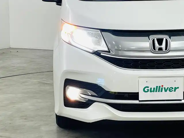 ホンダ ステップワゴン スパーダ ホンダセンシング 福島県 2017(平29)年 14.4万km ホワイトオーキッドパール ホンダセンシング/・衝突軽減ブレーキ/・アダプティブクルーズコントロール/・車線逸脱抑制機能/・路外逸脱警報機能/・誤発進抑制機能/・先行車発進お知らせ機能/・標識認識機能/純正ナビゲーション/・CD/DVD/AM・FM/TV/BT/SD/・バックカメラ/・ETC/前後ドライブレコーダー/両側パワースライドドア/革巻きステアリング/・ステアリングスイッチ/・パドルシフト/プッシュスタート/・スマートキー/ドアバイザー/純正フロアマット/LEDライト/・フォグライト/冬タイヤ