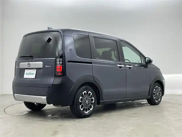 ホンダ フリード ハイブリット e:HEV クロスター 埼玉県 2025(令7)年 0.1千km メテオロイドグレーメタリック 登録済未使用車　純正９インチナビ　バックカメラ　ＢＳＭ　ホンダセンシング　アダプティブクルーズコントロール　シートヒーター　ハーフレザー　純正アルミホイール　オートハイビーム　ＬＥＤヘッドライト　ＴＶ