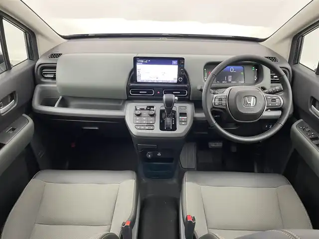 ホンダ フリード ハイブリット e:HEV クロスター 埼玉県 2025(令7)年 0.1千km メテオロイドグレーメタリック 登録済未使用車　純正９インチナビ　バックカメラ　ＢＳＭ　ホンダセンシング　アダプティブクルーズコントロール　シートヒーター　ハーフレザー　純正アルミホイール　オートハイビーム　ＬＥＤヘッドライト　ＴＶ