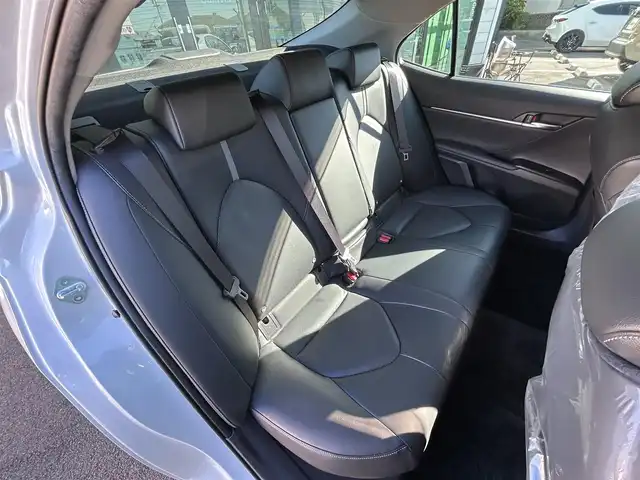 トヨタ カムリ WSレザーパッケージ 愛媛県 2019(令1)年 6.5万km プラチナホワイトパールマイカ 純正ナビ（Bluetooth/SD/フルセグテレビ）/ビルトインETC/バックカメラ/USB入力端子/追従型クルーズコントロール/リアクロストラフィックブレーキ/ブラインドスポットモニター/前後コーナーセンサー/前席パワーシート/前席シートヒーター/レーンキープアシスト/横滑り防止装置/衝突被害軽減システム/カーテンエアバック/純正18インチAW/LEDヘッドライト/フォグランプ/スペアキー